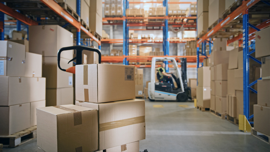 Warehouse full of brown cardboard boxes.