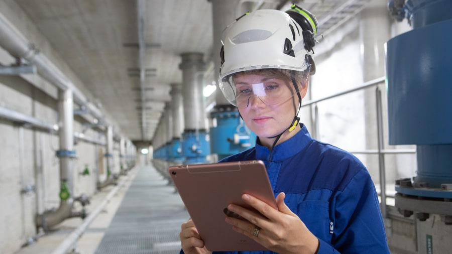 Worker at wastewater treatment plant.