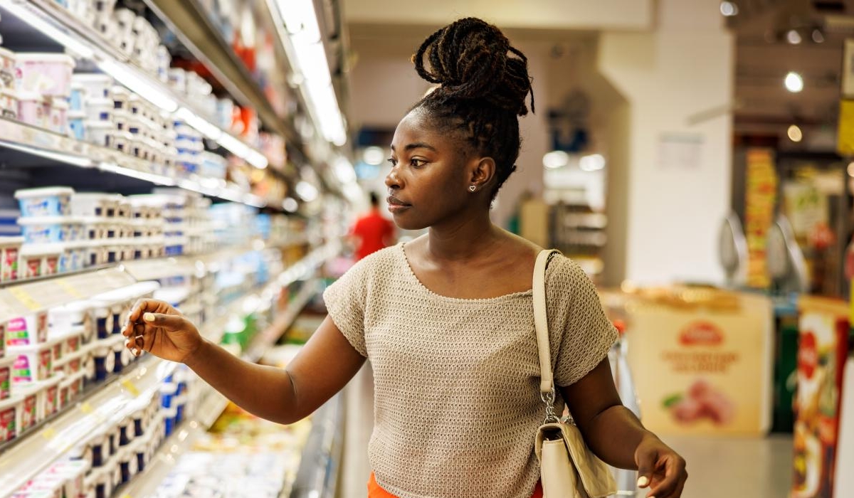 Woman shopping groceries in supermarket